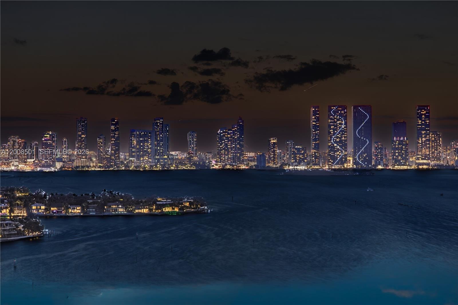 A night view of the Miami skyline across the water with illuminated high-rise buildings — 1900 Sunset Harbour Dr, Miami Beach FL 33139, MIAMI BEACH, FL