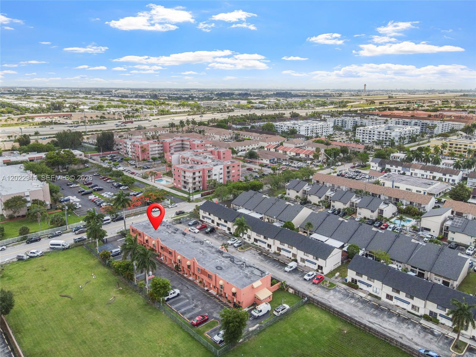 An aerial view shows a multi-unit residential building with a red pin marker — 8454 NW 8th St # 2, Miami FL 33126, MIAMI, FL