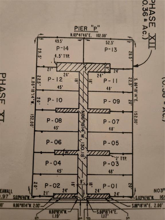 This is a survey map showing the layout and dimensions of individual boat slips labeled P-01 through P-14 — 2600 HARBOURSIDE DRIVE UNIT P-07, LONGBOAT KEY, FL