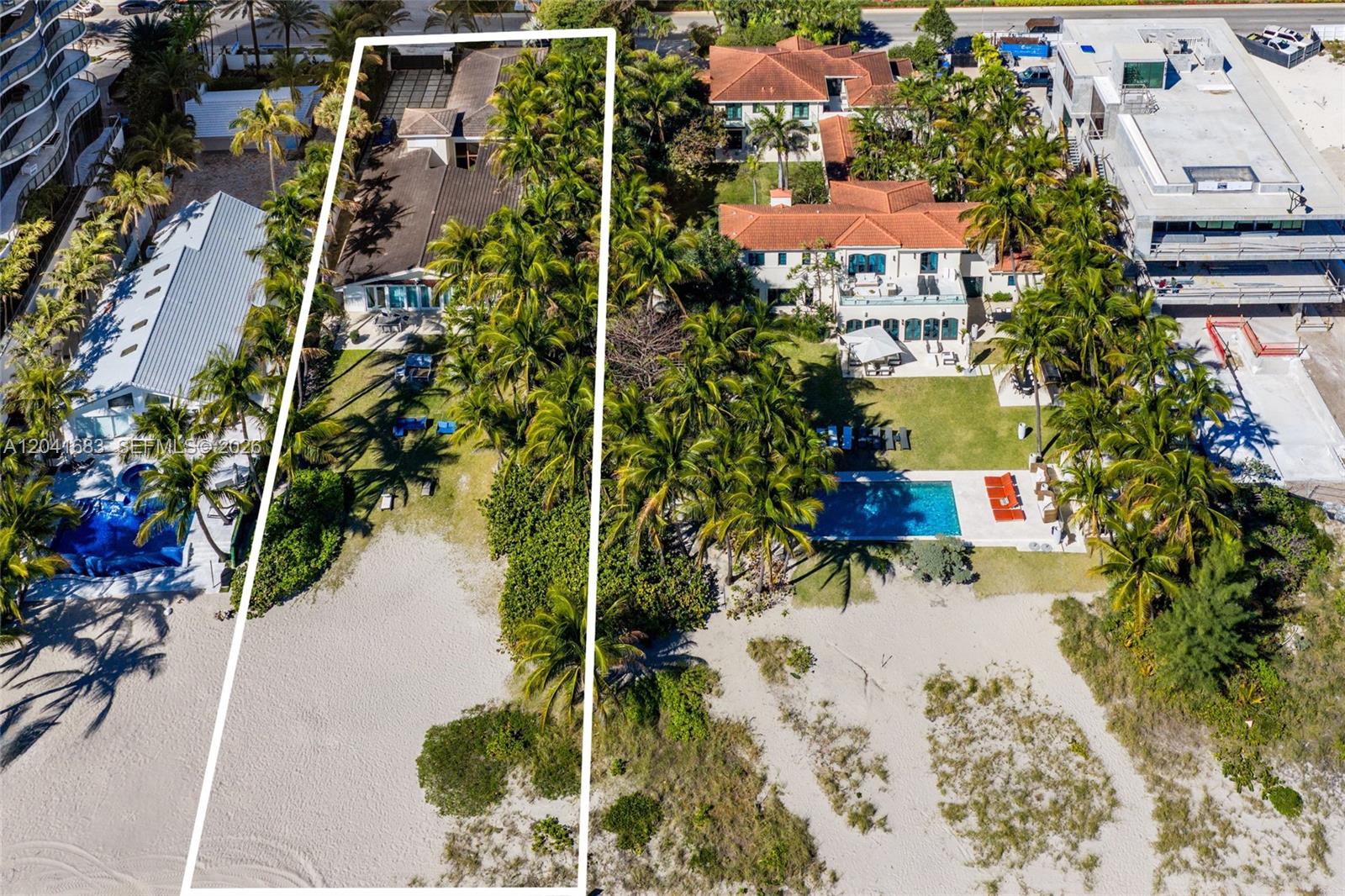 An aerial view shows two beachfront properties with palm trees, swimming pools, and sandy yards — 105 Ocean Blvd, Golden Beach FL 33160, GOLDEN BEACH, FL
