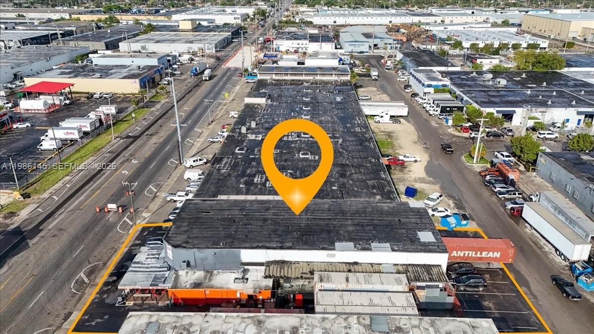 An aerial view shows a large industrial warehouse building with a prominent yellow location pin — 3595 NW 54th St, Hialeah FL 33142, HIALEAH, FL