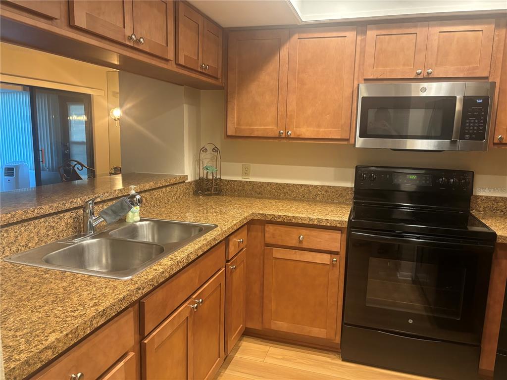 2765 COUNTRYSIDE BOULEVARD UNIT 106, CLEARWATER, FL — photo 4 of 25