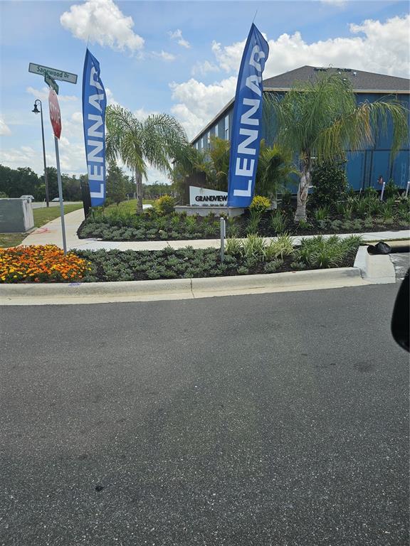 A street-level view shows a Grandview community entrance sign with Lennar flags and landscaping — 1230 ORION, DAVENPORT, FL