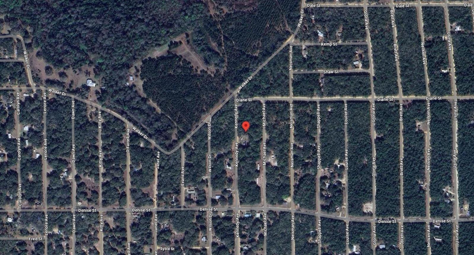 This is an aerial map view of a residential neighborhood with a red location pin — 622 Kennedy Avenue, FL 32148, FL