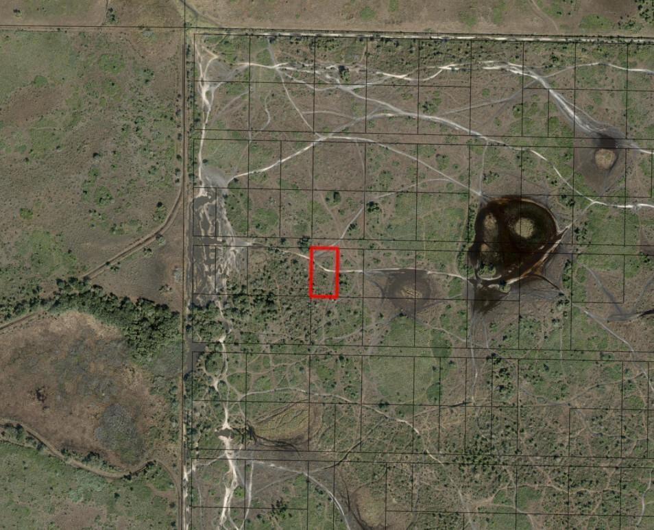 This is an aerial map showing a rectangular plot of land highlighted in red — 0 NW 316th Street, Okeechobee FL 34972, OKEECHOBEE, FL