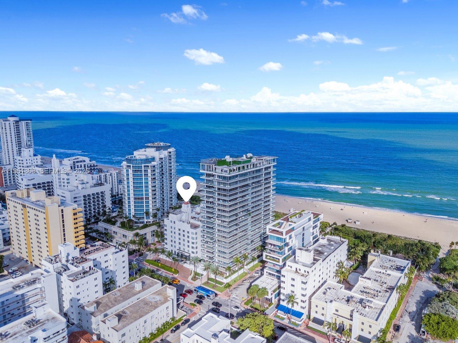An aerial view shows a white hotel building marked with a pin near the beach — 3739 Collins Ave # 207, Miami Beach FL 33140, MIAMI BEACH, FL