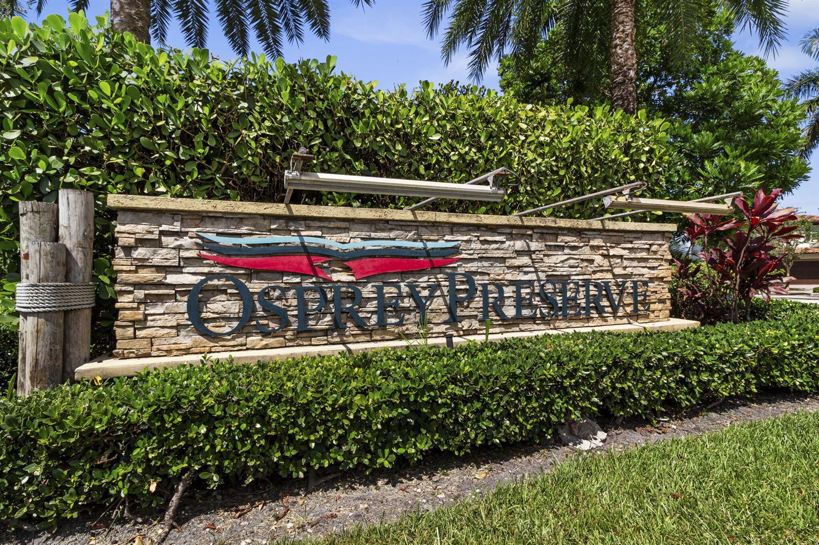 A stone monument sign for Osprey Preserve stands in front of lush green landscaping — 5319 Falcon Trail, Davie FL 33314, DAVIE, FL