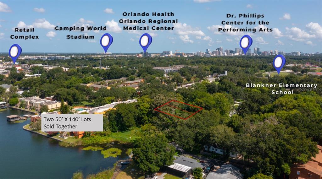 This aerial view shows a wooded lot near a lake with nearby city landmarks labeled — 2812 KEYSTONE DRIVE Lot 17 & 18, ORLANDO, FL