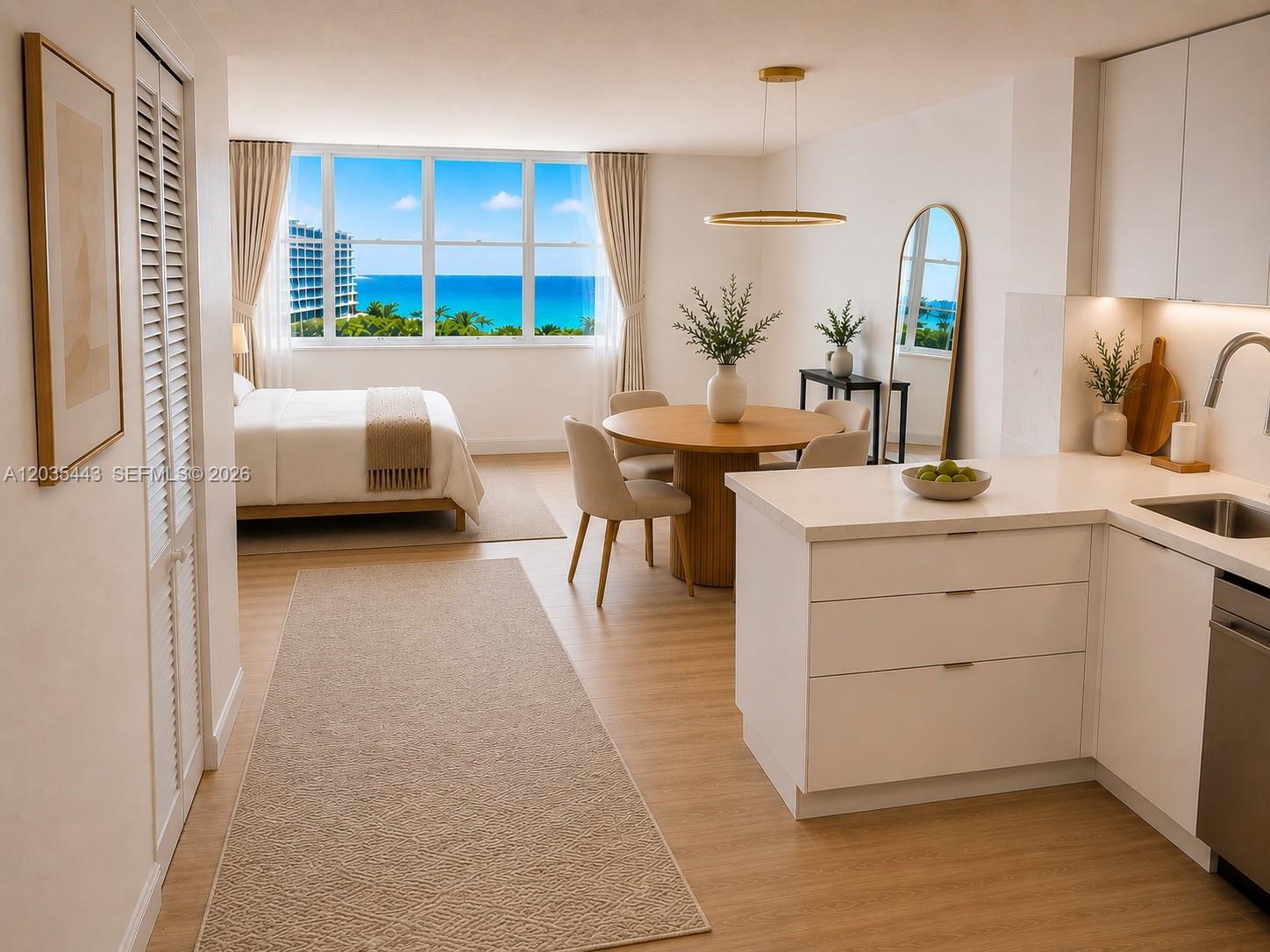 This studio apartment features a kitchen, dining area, and bedroom with ocean views — 801 Brickell Bay Dr # 1469, Miami FL 33131, MIAMI, FL