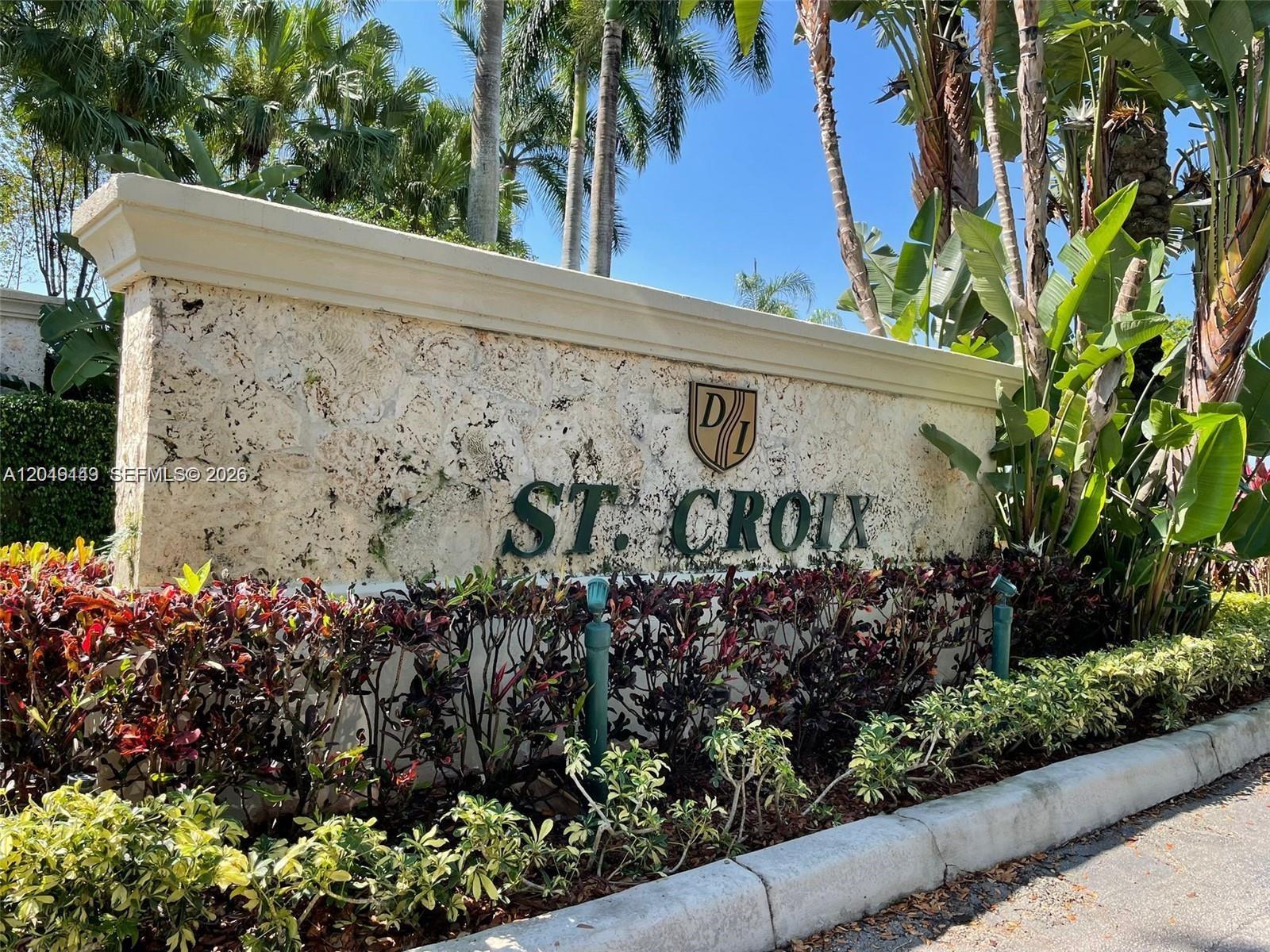 A stone monument sign for St. Croix stands in front of palm trees and landscaping — 10933 NW 73 TE, Doral FL 33178, DORAL, FL