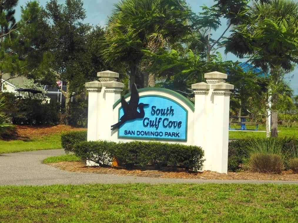 A sign for South Gulf Cove San Domingo Park stands between two white stone pillars — 10160 AMY TERRACE, PORT CHARLOTTE, FL