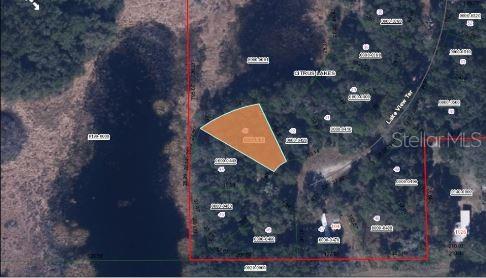 This is an aerial map showing a highlighted parcel of land in a wooded area — 103 LAKE VIEW TERRACE, CRESCENT CITY, FL