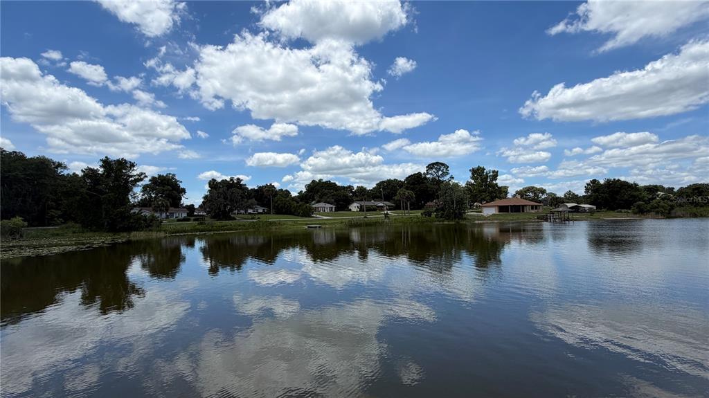 A view of a lake with houses and trees along the distant shoreline — 0 LAKEVIEW STREET, UMATILLA, FL