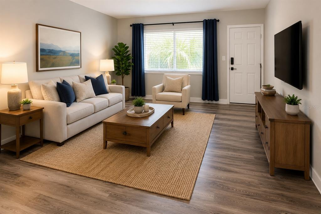 A living room features a beige sofa, wooden coffee table, armchair, and dark blue curtains — 3206 W AZEELE STREET UNIT 118, TAMPA, FL