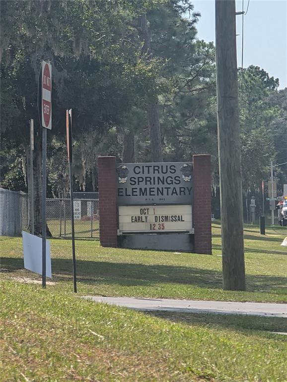 A brick sign for Citrus Springs Elementary School stands on a grassy lawn near trees — 3515 W CENTURY BOULEVARD, CITRUS SPRINGS, FL