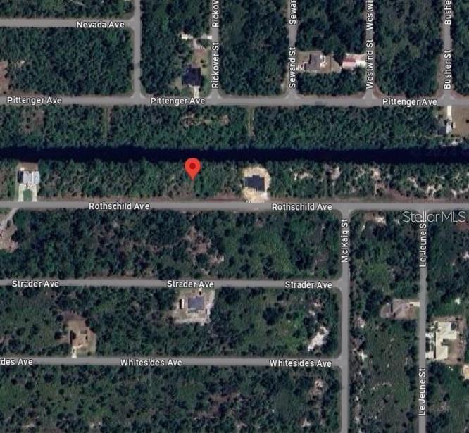 This is an aerial map view showing a vacant lot marked with a red pin — 14288 ROTHSCHILD AVENUE, PORT CHARLOTTE, FL