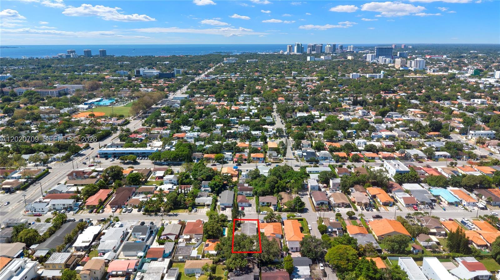 An aerial view shows a residential neighborhood with a red-outlined house in the foreground — 2275 SW 15th St, Miami FL 33145, MIAMI, FL
