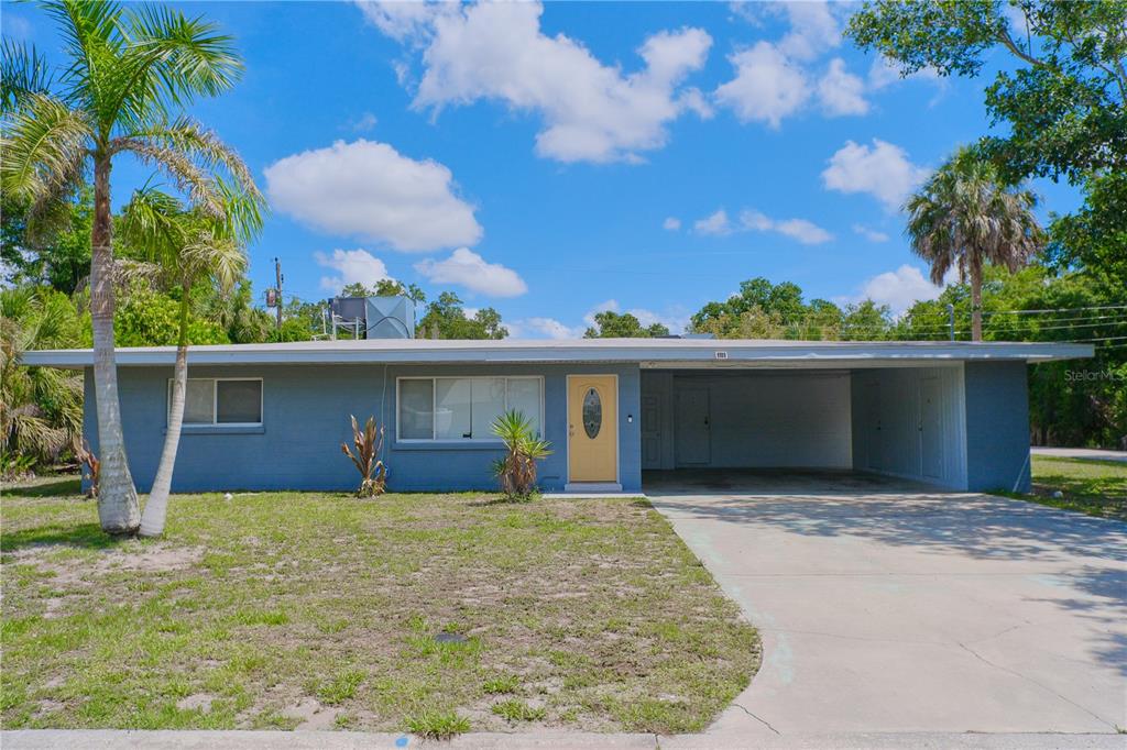 This aerial view shows a wooded park with a water tower and surrounding residential areas — 993 GARY STREET UNIT A & B, SARASOTA, FL