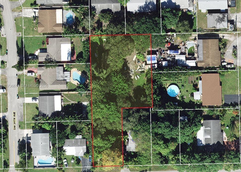 This is an aerial map showing a vacant, tree-covered lot outlined in red — 2361 SW 45th St, Dania Beach FL 33312, DANIA BEACH, FL