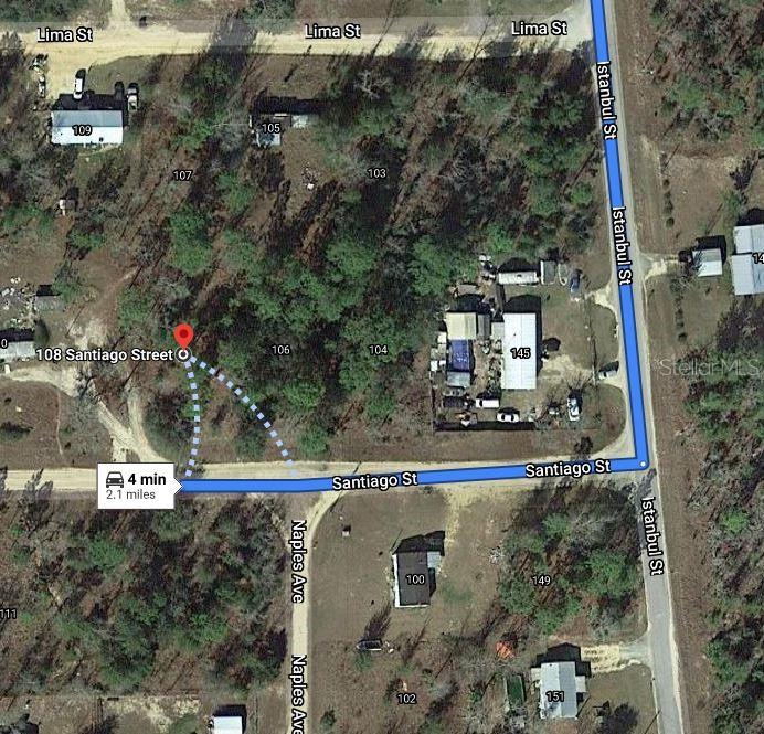 This is an aerial map showing a vacant lot located at the corner of two streets — 108 SANTIAGO STREET, INTERLACHEN, FL