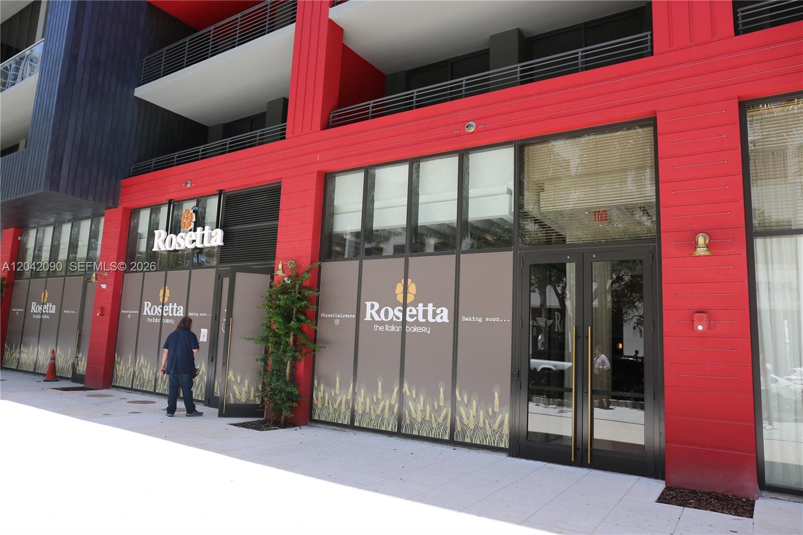The exterior of a red building features a storefront for Rosetta the Italian Bakery — 90 NE 32nd St # 706, Miami FL 33137, MIAMI, FL