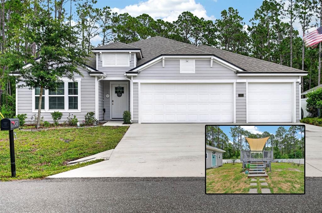 A gray single-story house with a three-car garage and an inset photo of a backyard deck — 51 SENTINEL TRAIL, PALM COAST, FL