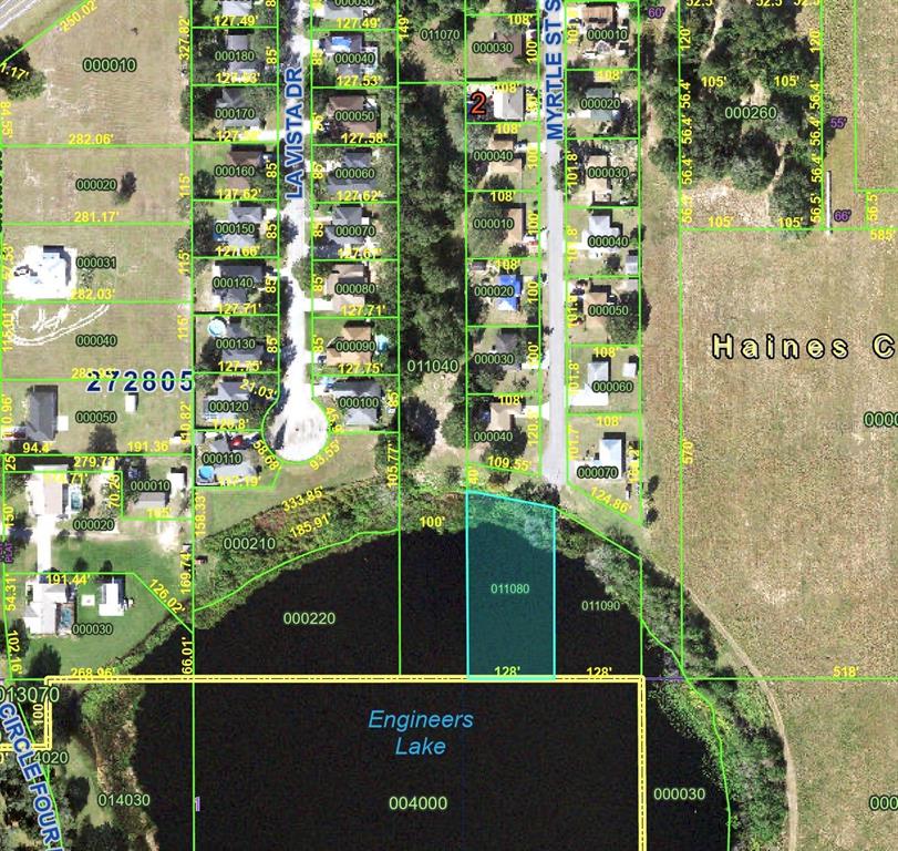 This is a property tax map showing residential lots and lakefront parcels — LAKE SHORE DRIVE, HAINES CITY, FL