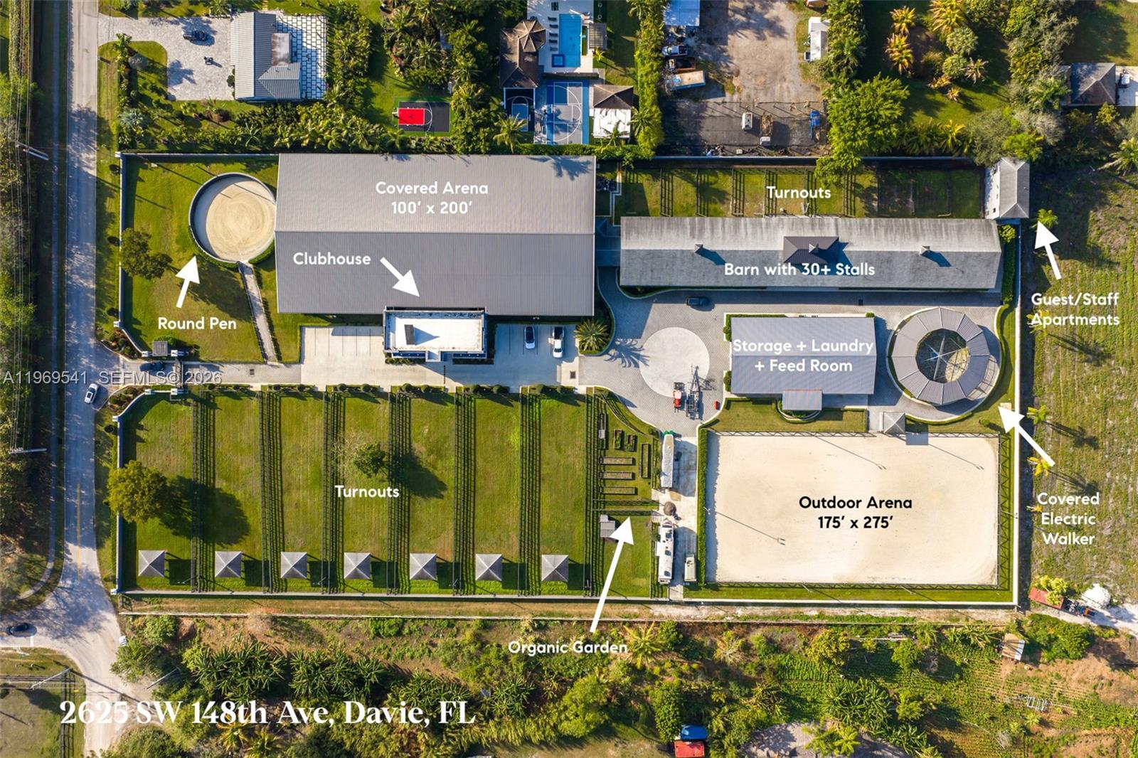 This aerial view shows an equestrian facility with arenas, a barn, turnouts, and outbuildings — 2625 SW 148th Ave, Davie FL 33331, DAVIE, FL