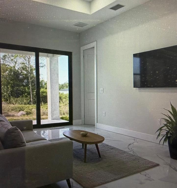 704 MINDORA AVENUE, LEHIGH ACRES, FL — photo 4 of 7