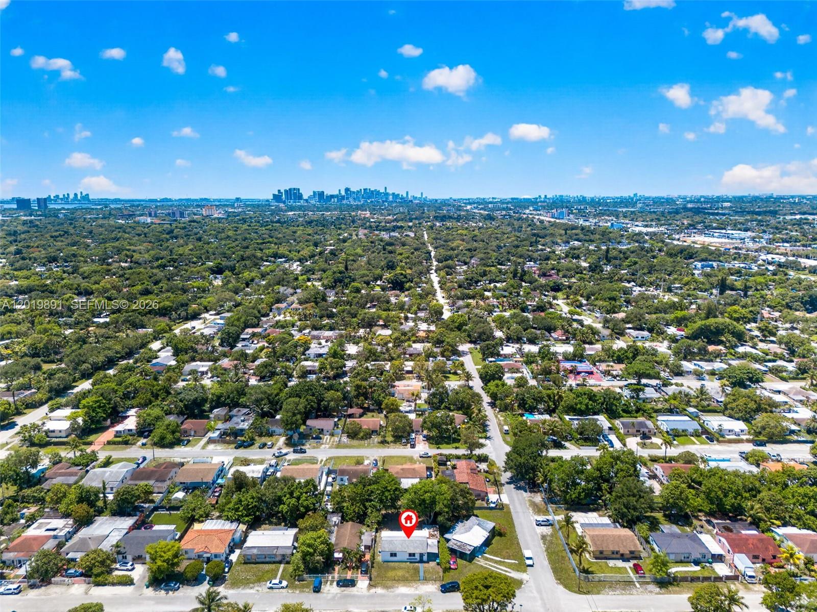 An aerial view shows a single-story house with a red location pin in a residential neighborhood — 280 NW 101st St, Miami FL 33150, MIAMI, FL