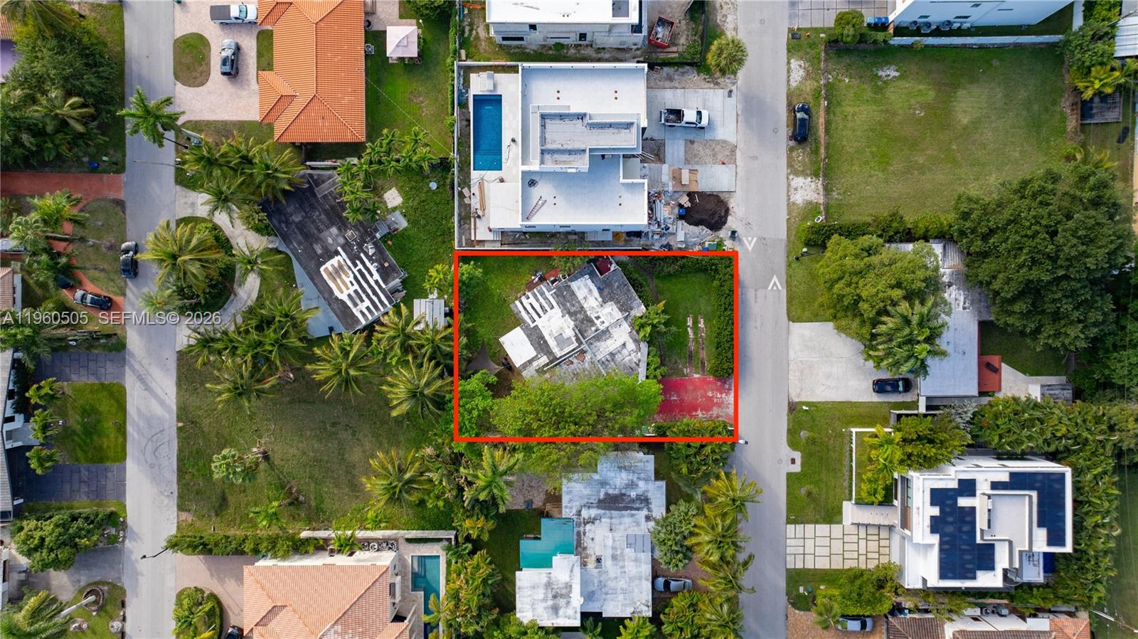 An aerial view shows a residential lot with a flat-roofed house and surrounding trees — 322 189th St, Sunny Isles Beach FL 33160, SUNNY ISLES BEACH, FL