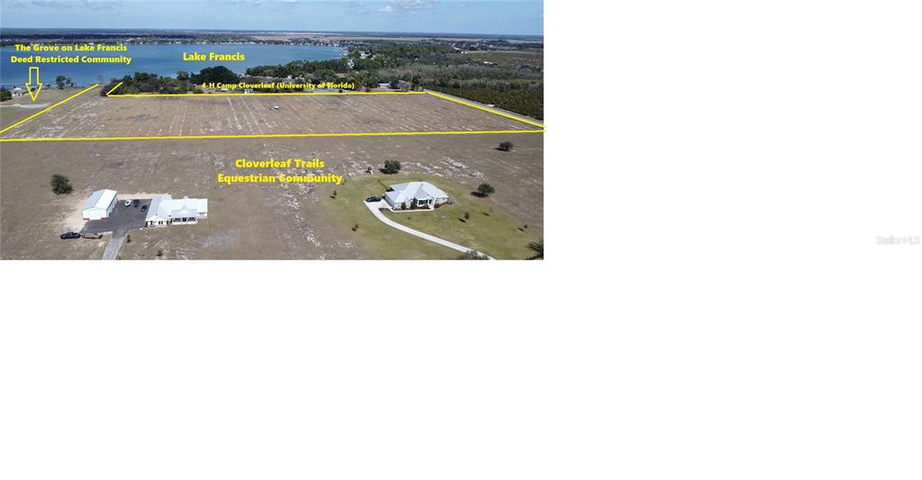An aerial view shows a large, rectangular plot of land near Lake Francis — 100 CLOVERLEAF ROAD, LAKE PLACID, FL