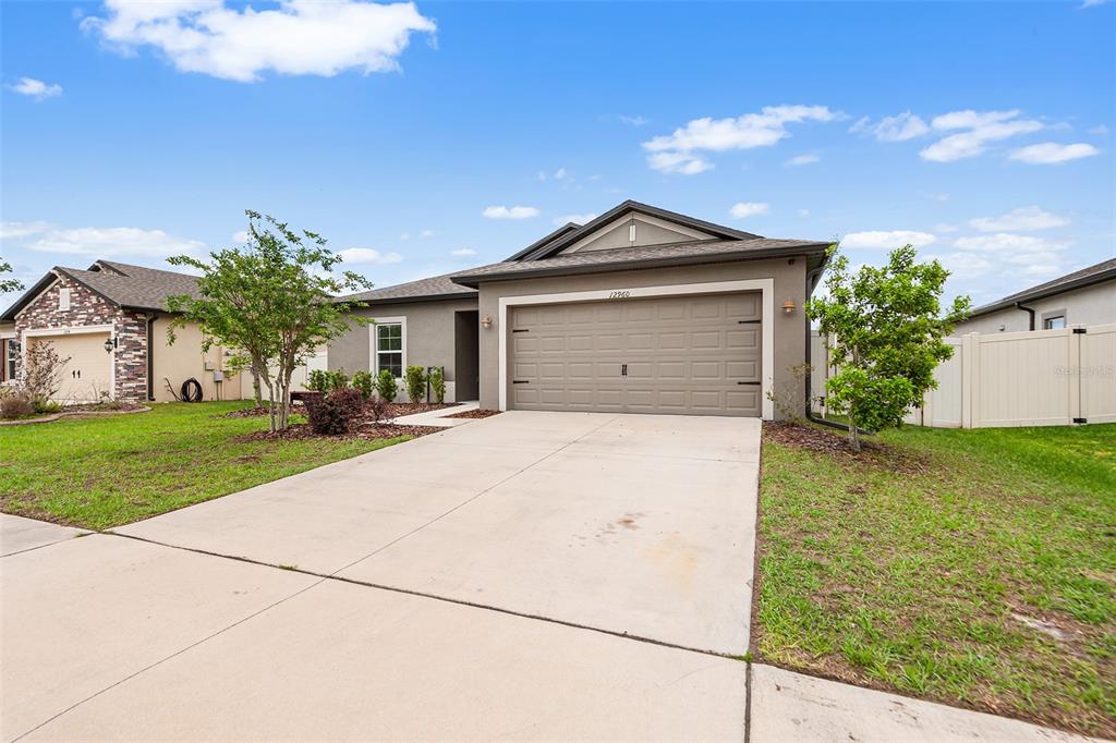 12960 CONQUISTADOR LOOP, SPRING HILL, FL — photo 2 of 26
