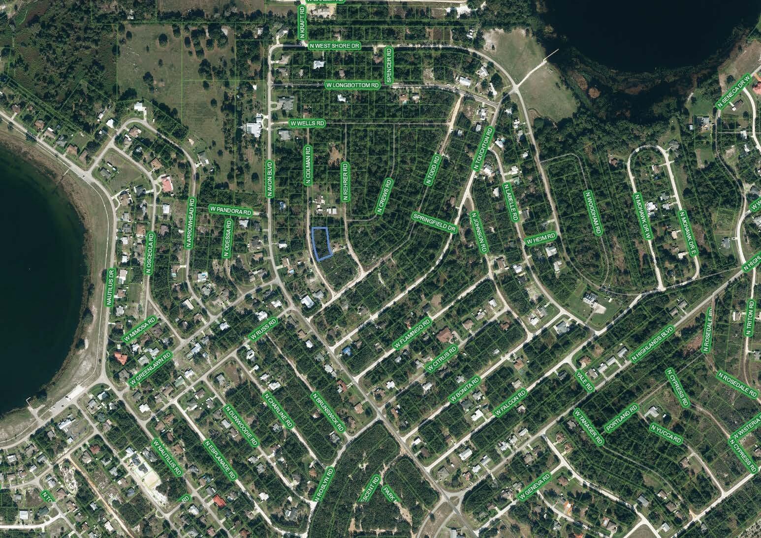 This is an aerial map view of a residential neighborhood with a highlighted property — 2610 N Colman Road, FL 33825, FL