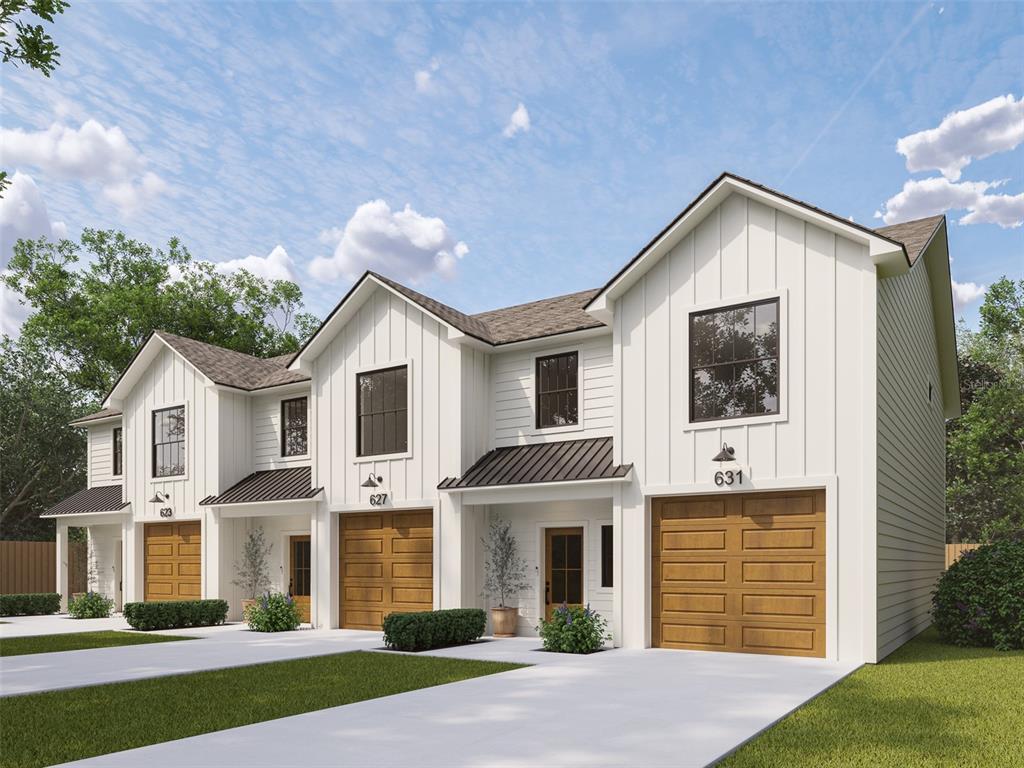 This is a rendering of a row of three white modern farmhouse-style townhomes with garages — 124 N MILLER ROAD, VALRICO, FL