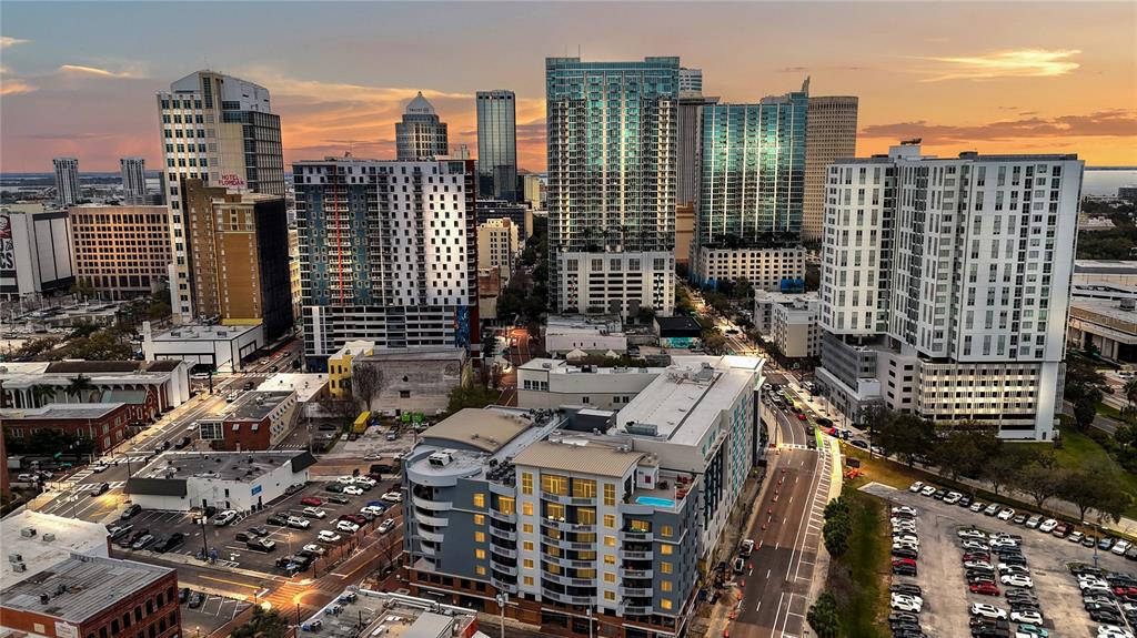 An aerial view of a city skyline featuring various high-rise buildings and parking lots — 1108 N FRANKLIN STREET UNIT 707, TAMPA, FL