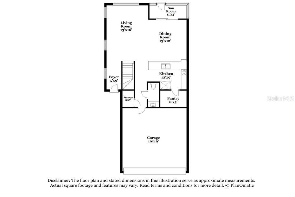 This is a floor plan of a home featuring a garage, kitchen, and living areas — 17506 RADIANT SHINE WAY, LUTZ, FL