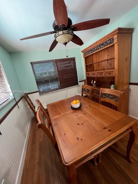 A dining room features a wooden table, chairs, a hutch, and a ceiling fan — 413 SW 2nd Ave, Dania Beach FL 33004, DANIA BEACH, FL