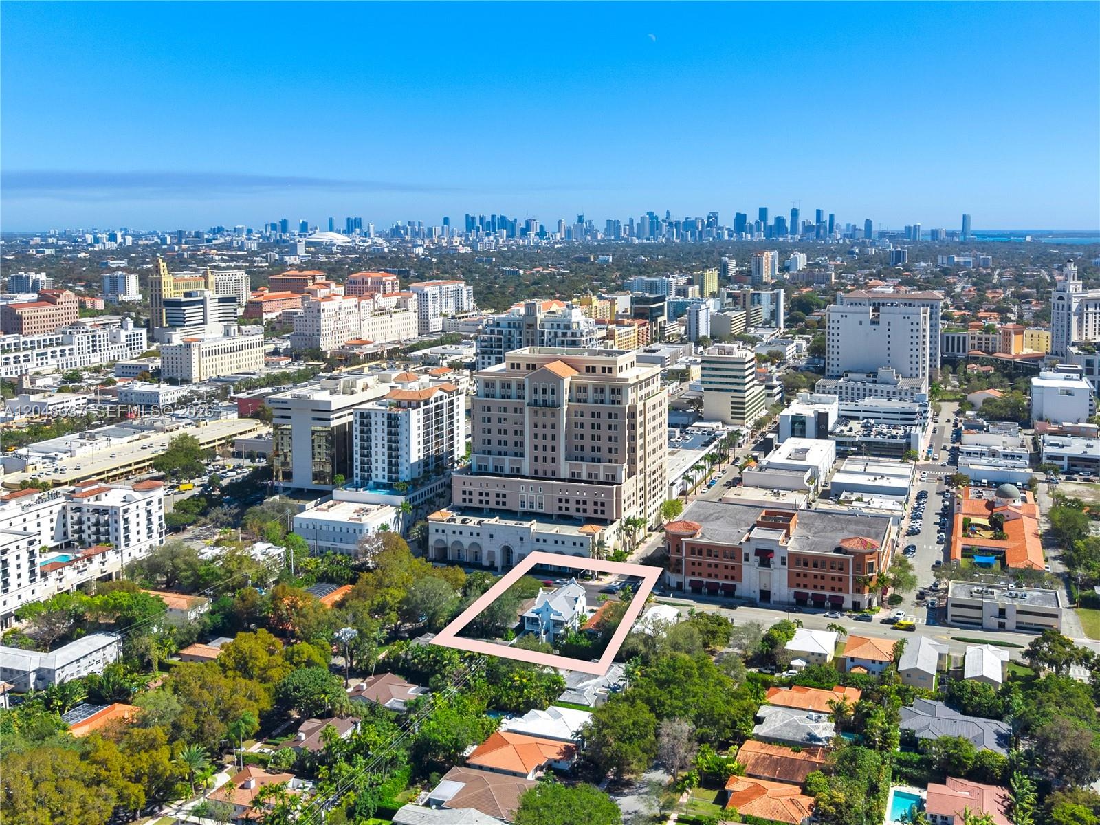 An aerial view shows a single-family home highlighted within a lot in a city — 2712 S Le Jeune Rd, Coral Gables FL 33134, CORAL GABLES, FL