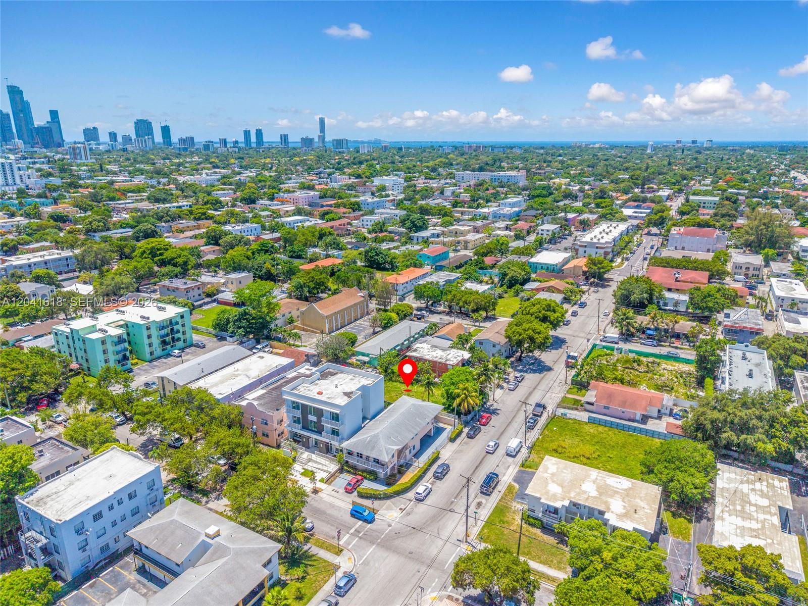 An aerial view shows a city neighborhood with a red pin marking a specific property — 219 SW 16th Ave, Miami FL 33135, MIAMI, FL