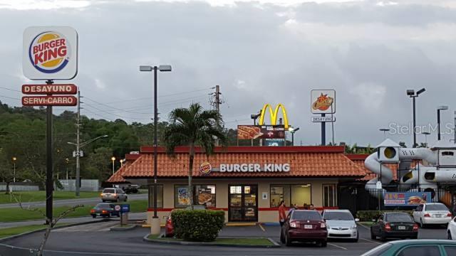 A Burger King restaurant with a drive-thru, parking lot, and a playground structure — PR-111 Km. 20.3 PR-111 KM. 20.3, SAN SEBASTIAN, PR