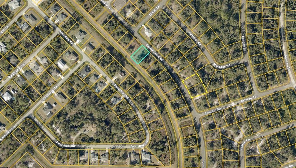 This is an aerial map view showing a highlighted vacant lot on a residential street — Lot 69 CONSTITUTION DRIVE, NORTH PORT, FL