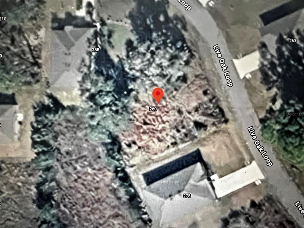 This is an aerial map view showing a vacant residential lot on Live Oak Loop — 260 LIVE OAK LOOP, CRESCENT CITY, FL