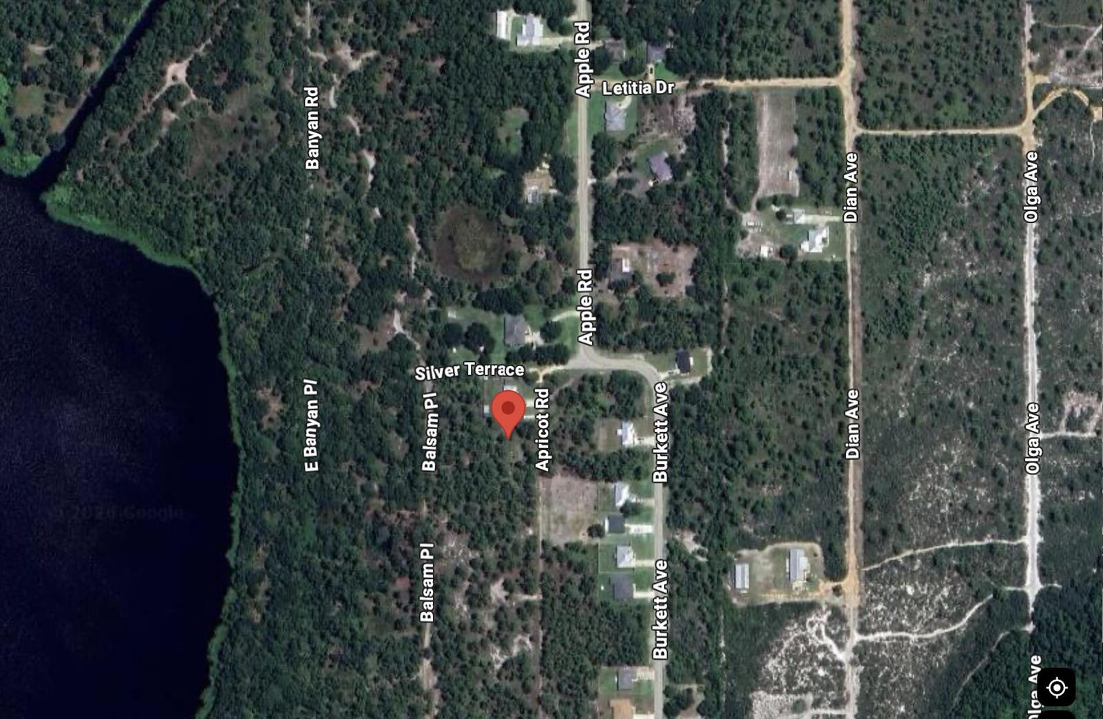 This is a satellite map view of a residential area with streets and a lake — 6503 E Apricot Place, Sebring FL 33875, SEBRING, FL