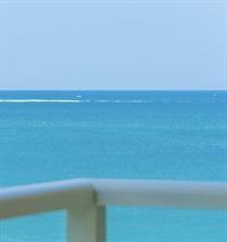A view of the ocean from a balcony with a white railing — 1000 S Ocean Boulevard # 6n, Pompano Beach FL 33062, POMPANO BEACH, FL