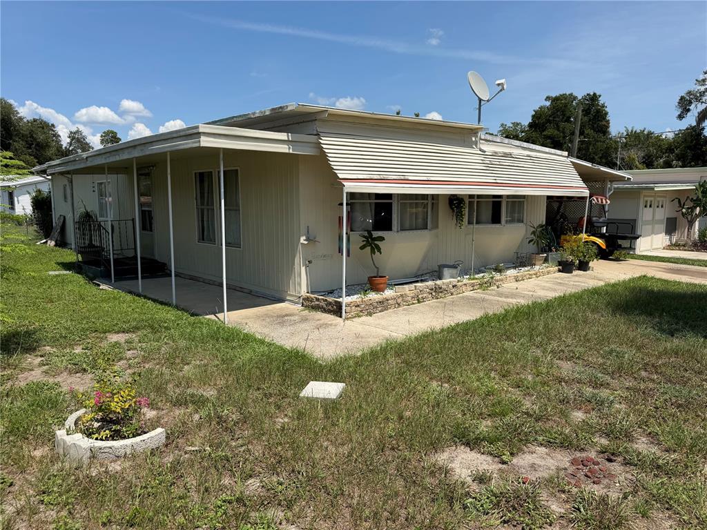 1408 RIDGE ROAD, TAVARES, FL — photo 2 of 25