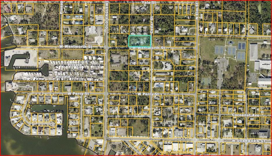 This is an aerial map showing a highlighted vacant lot in a residential neighborhood — 212 CEDAR STREET, ENGLEWOOD, FL