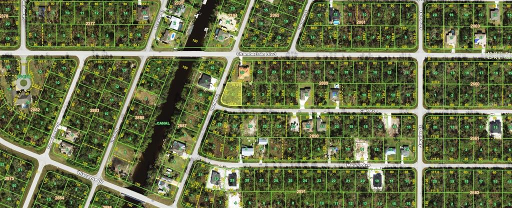 This is a satellite map view of a residential neighborhood with vacant lots and houses — 1024 HOFFER STREET, PORT CHARLOTTE, FL