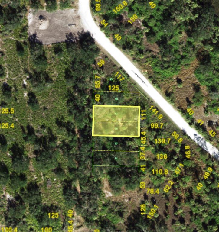 This aerial map shows a highlighted rectangular land parcel surrounded by wooded terrain and roads — 1226 SULSTONE DRIVE, PUNTA GORDA, FL
