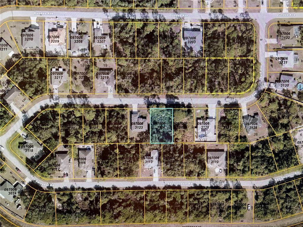 This is an aerial map showing residential lots and streets in a suburban neighborhood — LOT 24 SURF AVENUE, NORTH PORT, FL